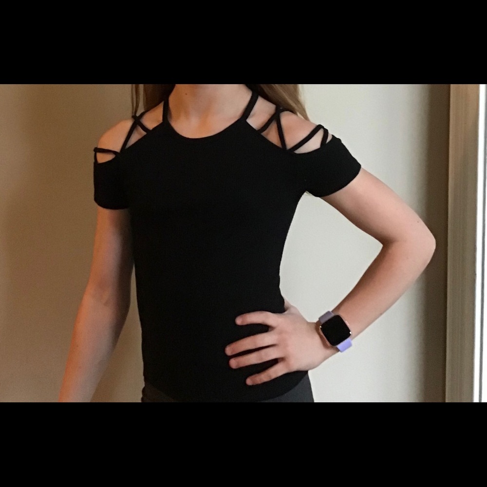 Cute black top with cut outs on the side.